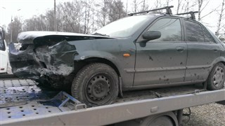 Mazda 323 седан 2000 г.